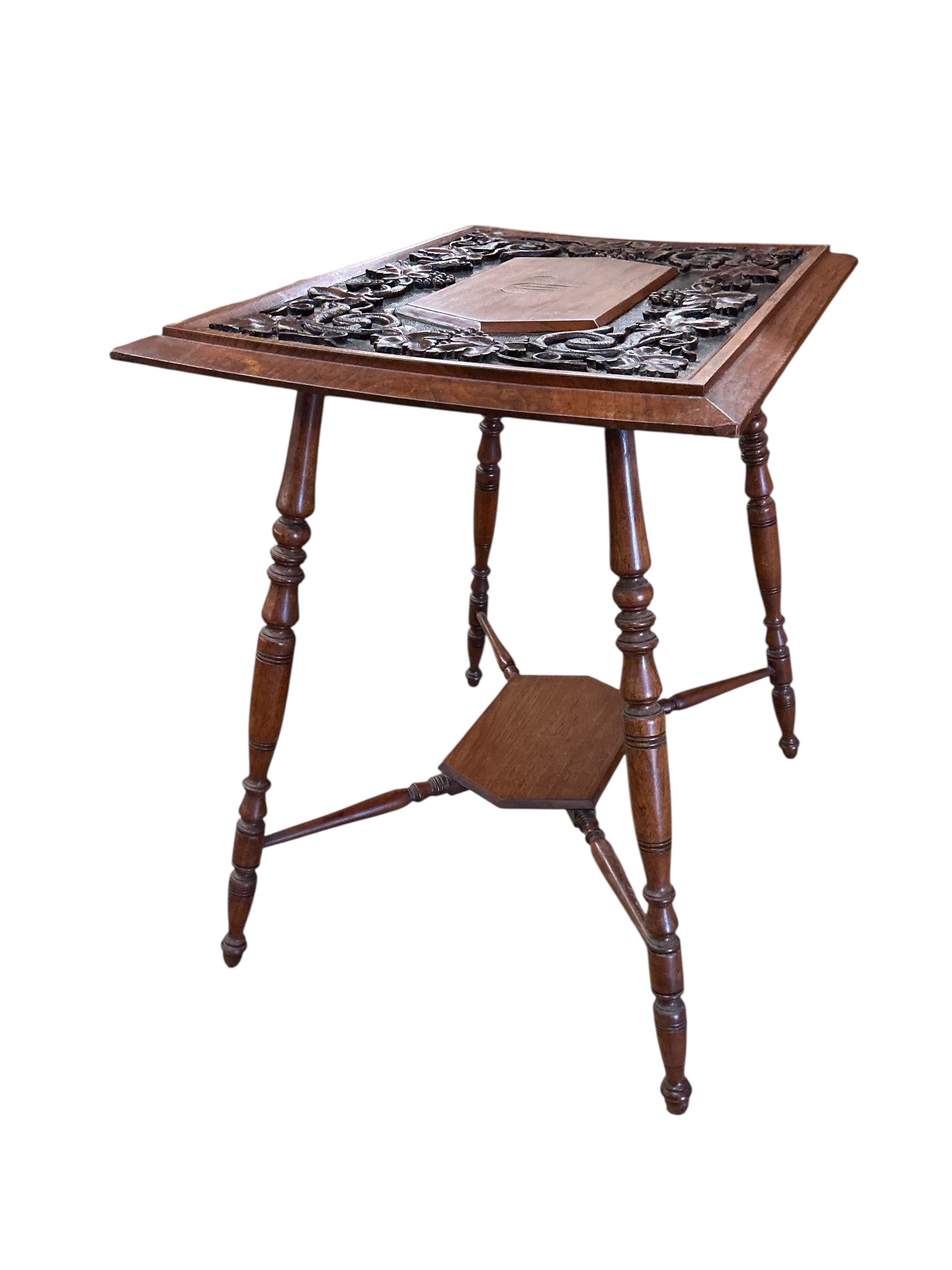 A late Victorian rectangular carved oak occasional table, decorated with vines, width 66cm, depth 49cm, height 67cm